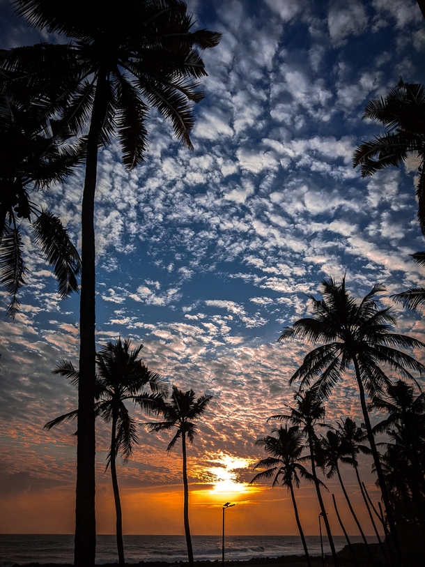 Kerala India Skys been gloomy with monsoon clouds for weeks but the sunset yesterday was simply breathtaking