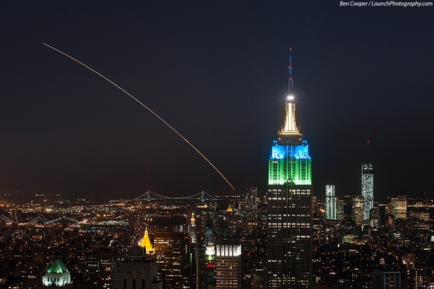 LADEE heads to moon aboard Minotaur V as seen against the New York skyline from Rockefeller Center 