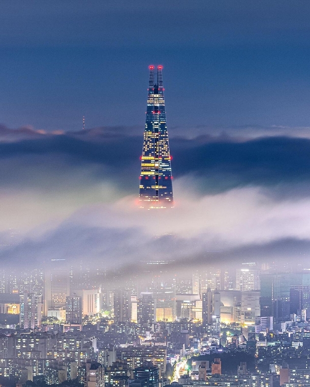 Layers of the city divided by a sea of clouds Seoul South Korea