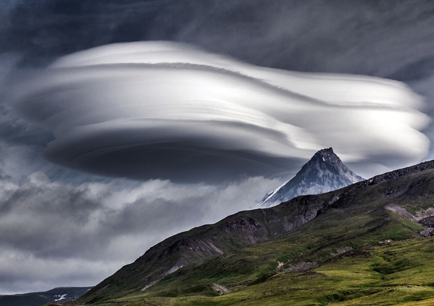 Lenticular clouds over Kamchatka peninsula - Russia - Photograph by Vladimir Voychuk