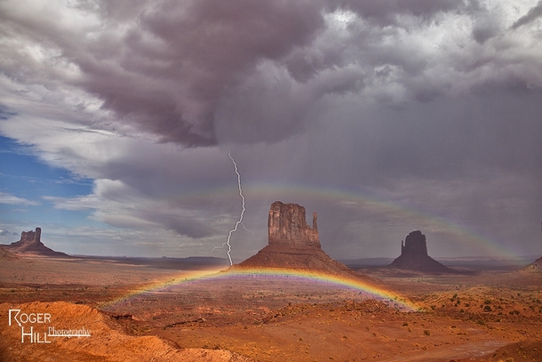 Lightning and rainbows in Monument Valley Photo by Roger Hill 