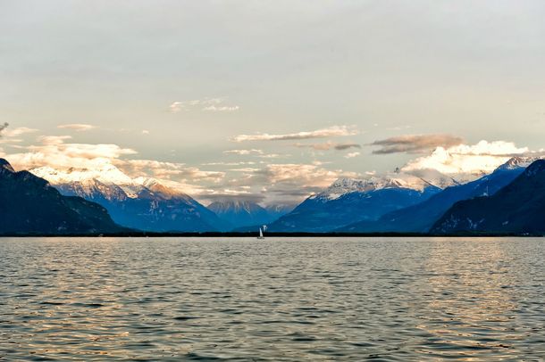 Looking towards the French Alps during sunset  Lake Geneva in Vivey Switzerland 