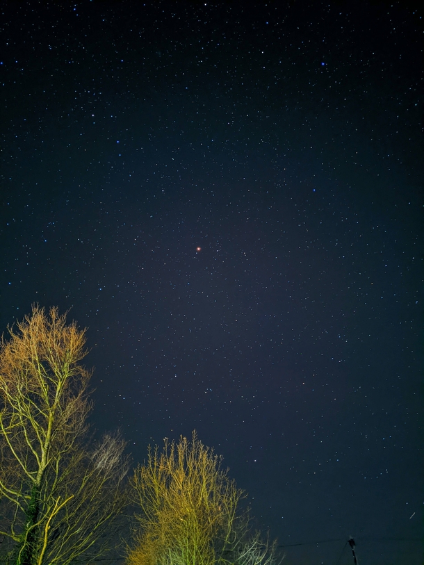 Lovely clear night yesterday so tried out the astrophotography life on my Pixel a Bright red spot is Mars