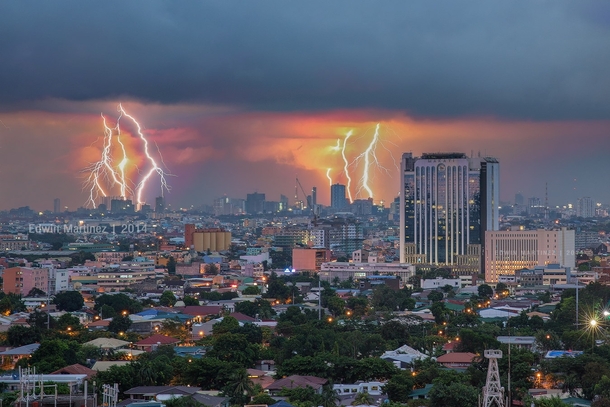 Makati Philippines in a lightning storm  by Edwin Martinez