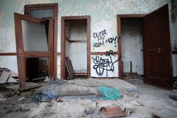 Makeshift bedroom in abandoned post office Gary Indiana OC 