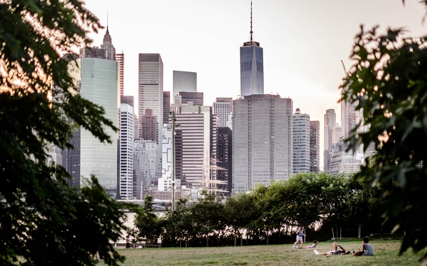 Manhattan skyline dwarfing a park in Brooklyn - New York NY - 