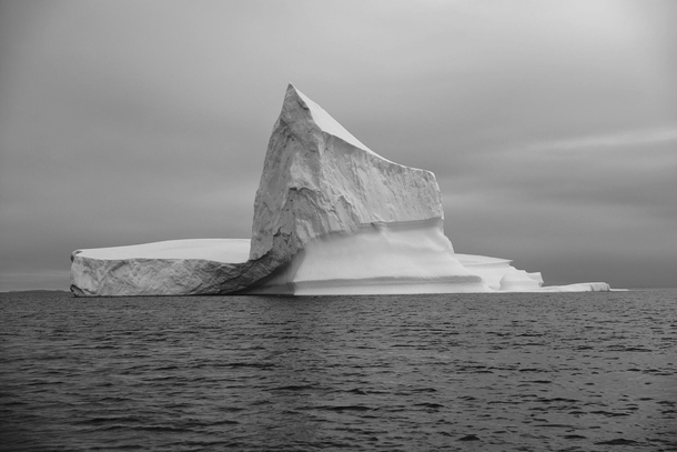 Massive iceberg floating in Disko Bay Illulisat Greenland 