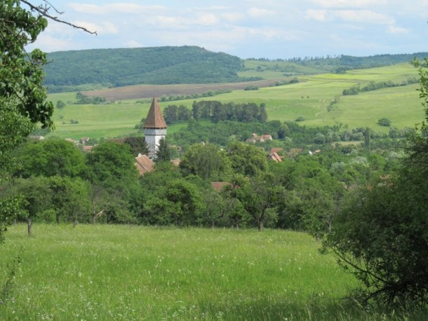 Mesendorf transylvania and a Saxon church from a meadow above the village 