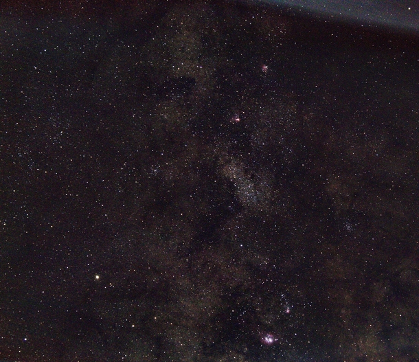 Milky way and four nebula at mm in bortle  in the middle of a  million populated city