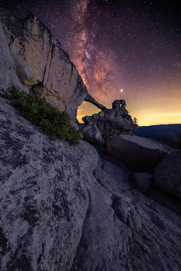 Milky Way shining brightly over Indian Rock Yosemite National Park 