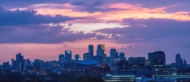 Minneapolis MN set ablaze by a pink and purple sunset 