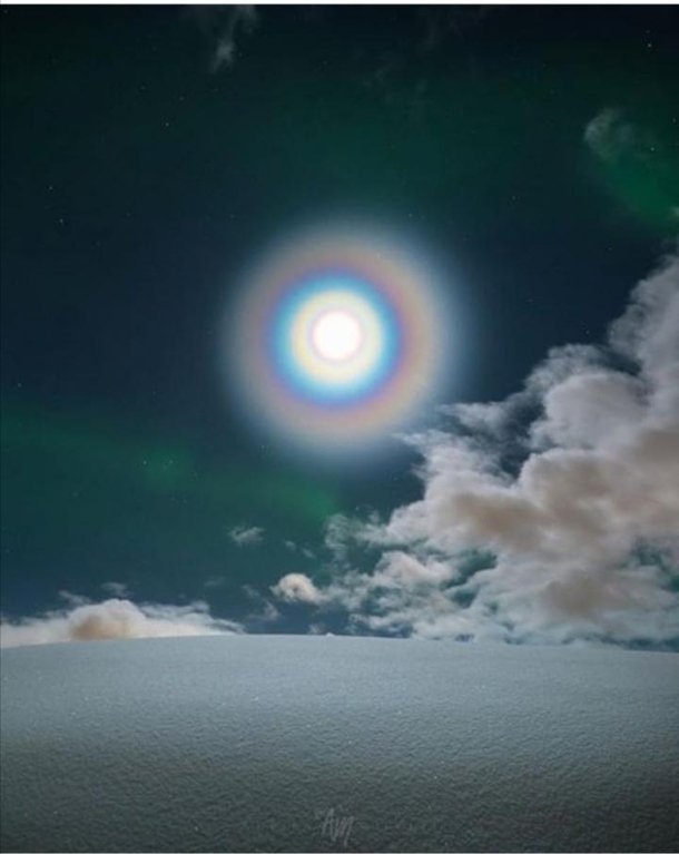 Moon corona in the midst of auroras