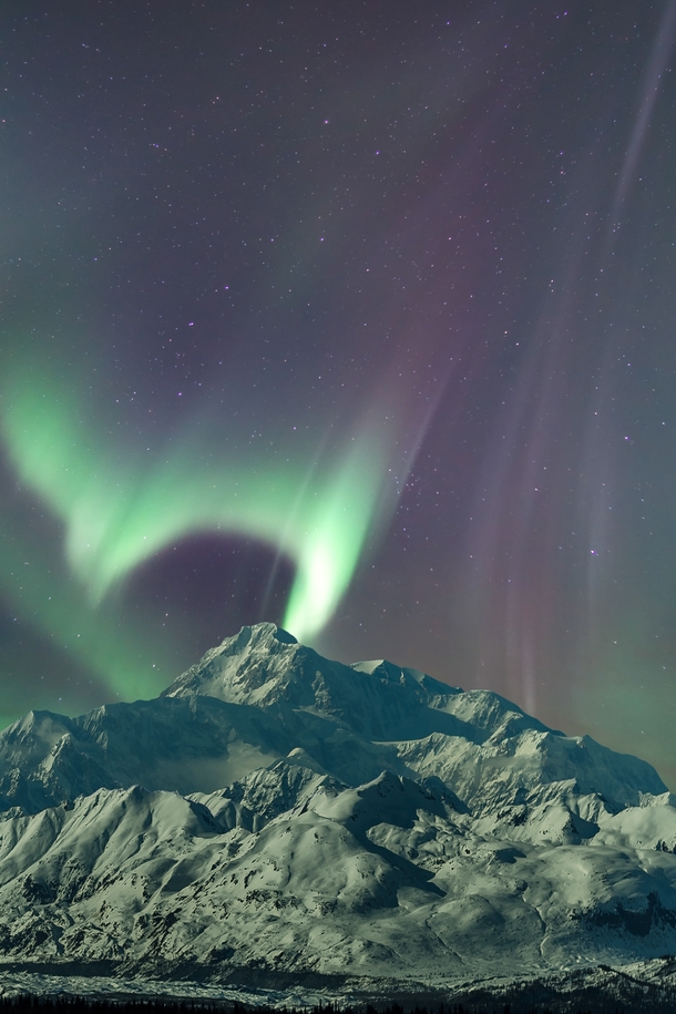 Moonlit Northern lights over Denali in Alaska 