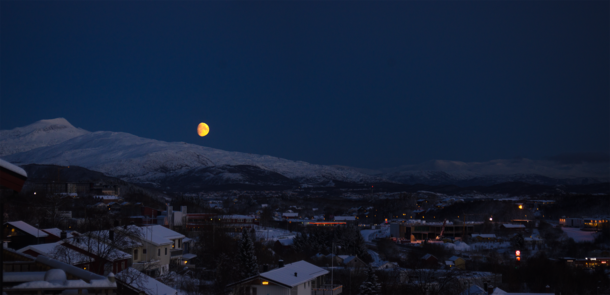 Moonrise over snowcovered mountains - Bod Norway 