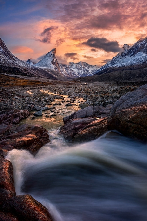 Mount Thor the worlds tallest vertical cliff Baffin Island Canada  Photo by Artur Stanisz xpost from rTrueNorthPictures