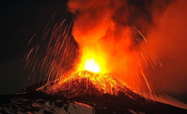 Mt Etna Europes most active volcano spews lava during an eruption as seen from Acireale near the Sicilian town of Catania Italy on November   