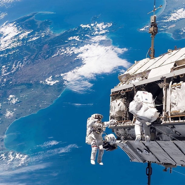 NASA astronauts working on the construction of the International Space Station over New Zealand in December 
