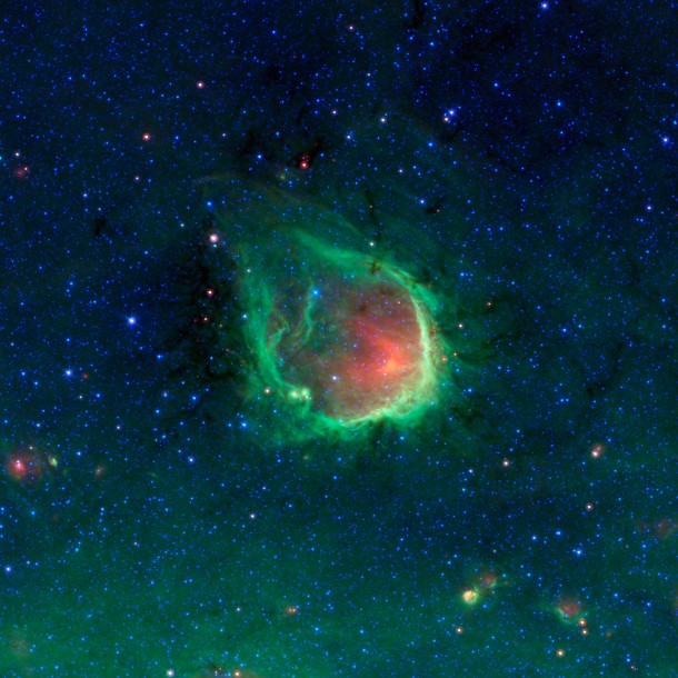 NASAs Spitzer Space Telescope detects a green ring nebula named RCW  