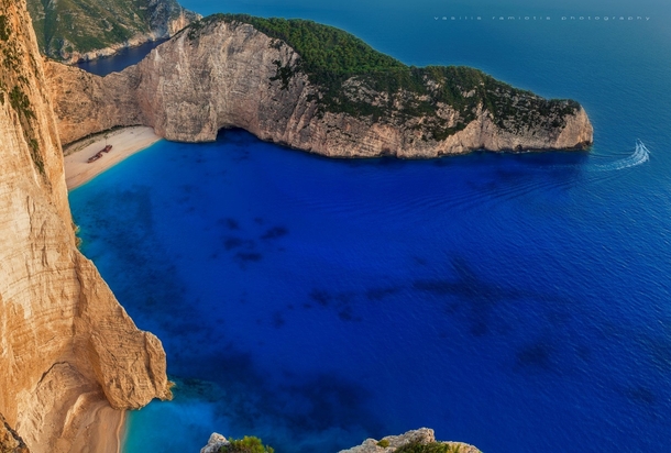 Navagio Beach also named Shipwreck Beach on the Greek Island of Zakynthos  photo by Vasilis Ramiotis