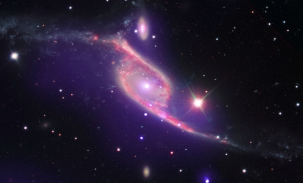 NGC  Galaxy Collision Switches on Black Hole 