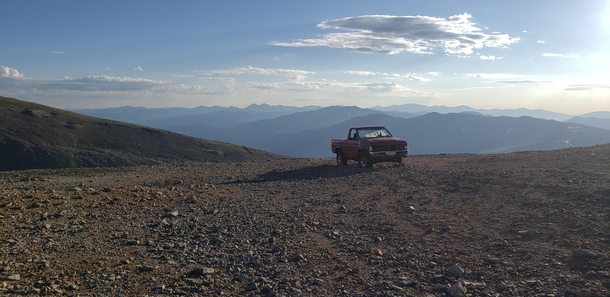 Nissan pickup somehow abandoned near the trail between Mount Bross ft and Mount Lincoln ft Alma CO