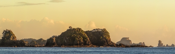 Northlands east coast and the Four Islets at sunrise New Zealand 