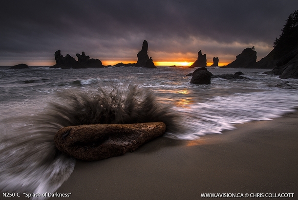 Northwest Coast of WA USA Capturing a slightly long exposure of a wave hitting wooden debris carved for a long time by the ocean while the sun is about to set 