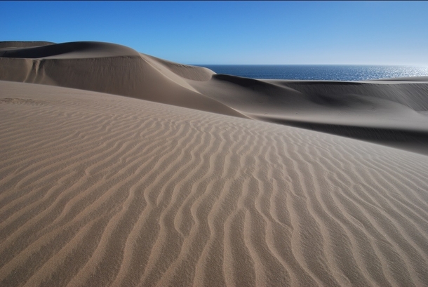 Not a Mirage Where the Namib Desert meets the sea  Photo by John Dera