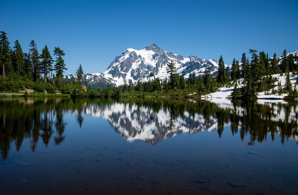 One of Americas most photographed vistas Mt Shuksan from Picture Lake WA 