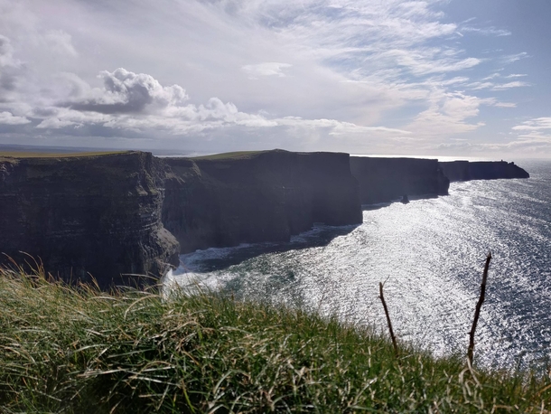 One of the rare times its both sunny and free of crowds Cliffs of Moher Ireland 