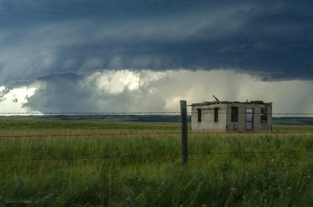 One room shack against tornado warned storm 