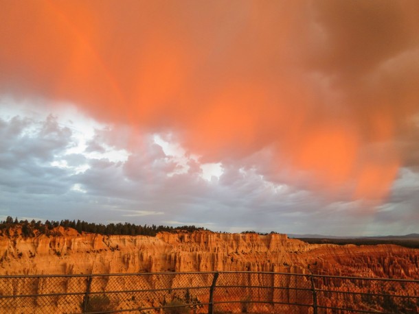 Orange morningclouds with rainbow Bryce Canyon Utah 