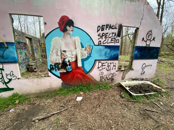Painting on the back of the abandoned church in Maryland before it was defaced more 