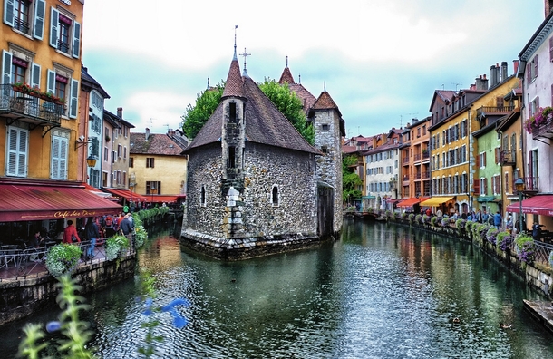 Palais de lIle castle is a stunning sight in the storybook town of Annecy France 