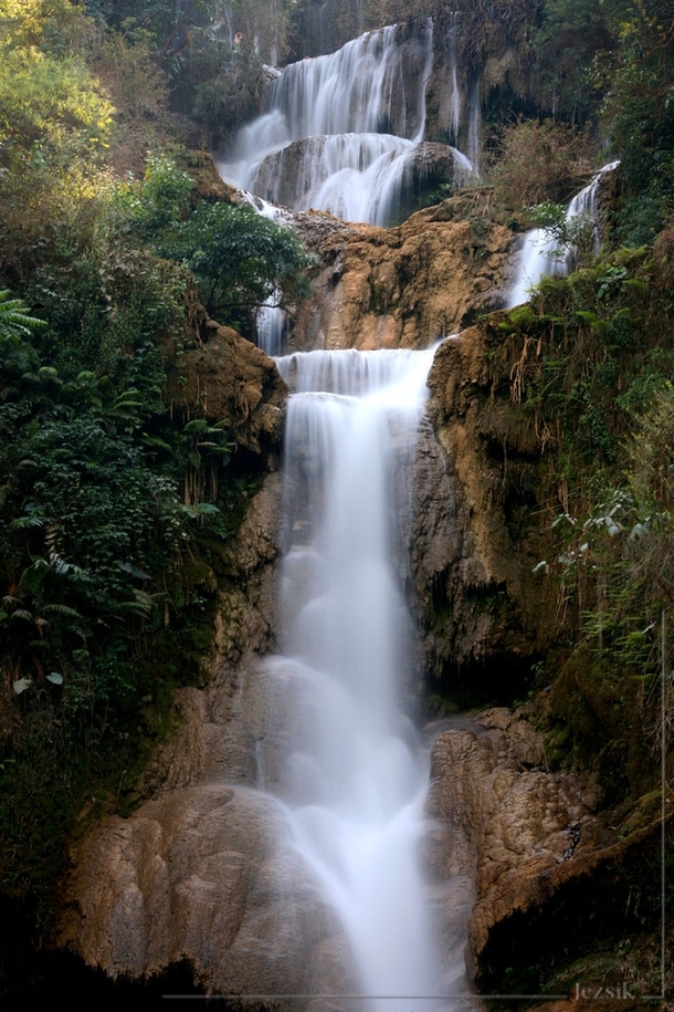 Part of the m tall travertine cascades of Kuang Si waterfall Luang Prabang Laos 