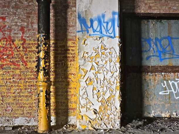 Peeling paint in an abandoned Baltimore warehouse