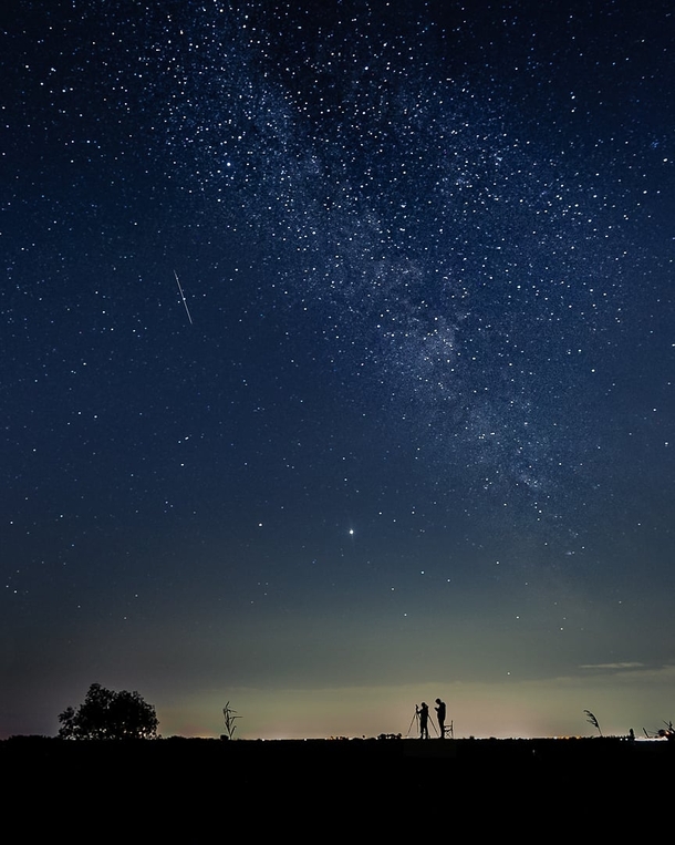Perseid meteor Milky Way Jupiter Saturn and Winnipegs urban glow