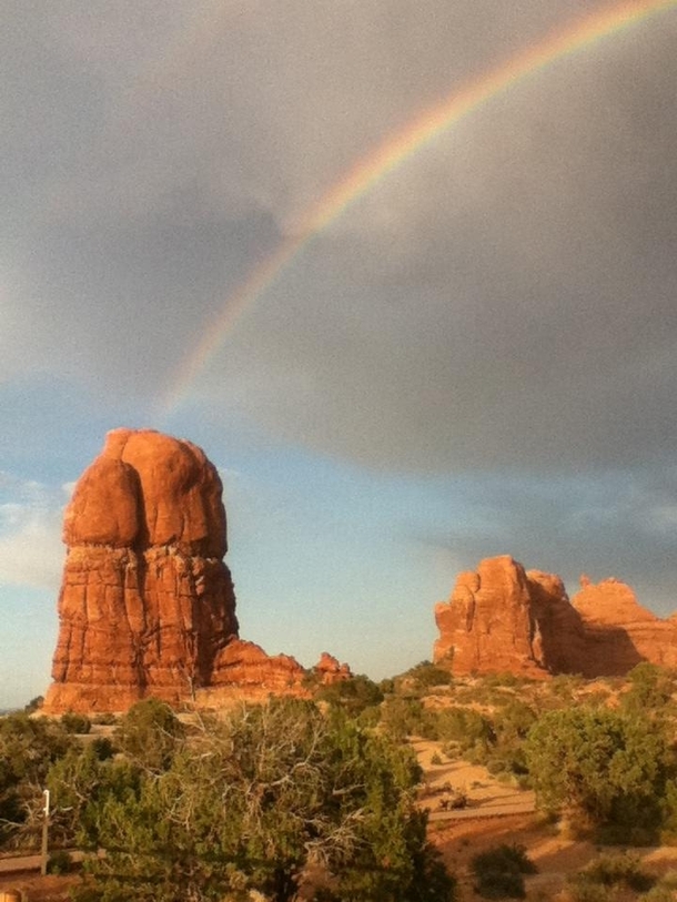 Phallic Rock Stack with Conspicuous Rainbow in Arches NP Moab Utah 