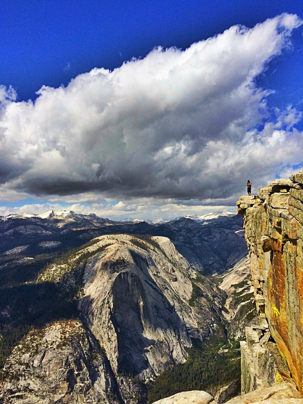 Photo that was taken off me on the top of Half dome in Yosemite  a sight I wish everyone could experience