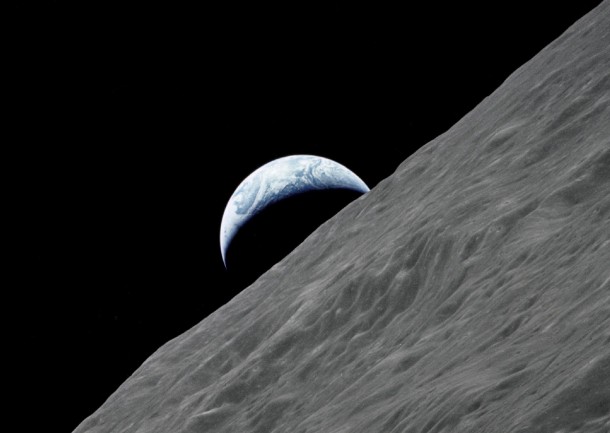Photograph taken from the Apollo  spacecraft in  as the Earth rises above the lunar horizon 