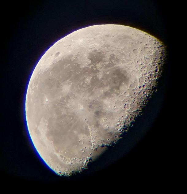 Picture of the moon taken with my cellphone from a mm refractor My second ever attempt at astrophotography 