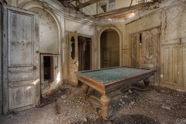 Pool table in an abandoned chateau Photo by MGness_ 