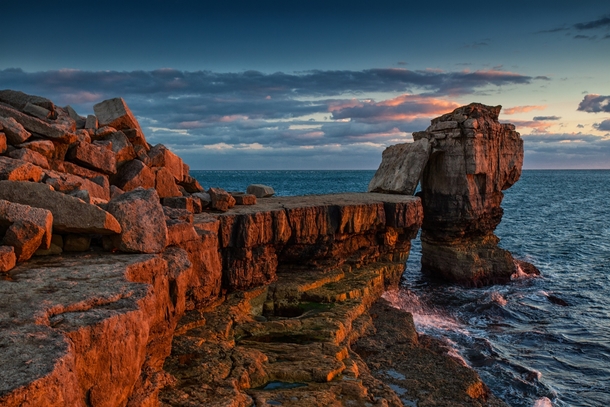 Portland Rock in the Jurassic Coast of Dorset England  by Tom Eversley