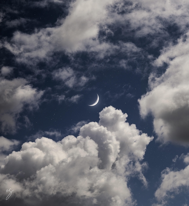 Puffy cloud and crescent moon composite 