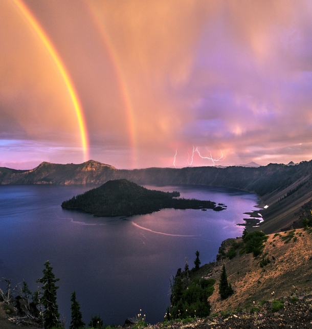 Rainbows and lightning on Crater Lake Oregon Photo by Jasman Mander 