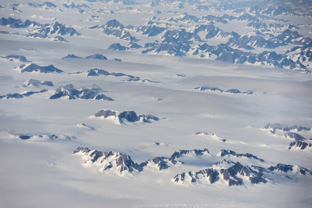Really glad I chose a window seat Flying high over Greenland 