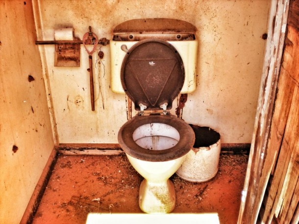Red dirt covered bathroom in Australias outback 