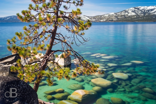 Reddit liked my last photo here so here is another Crystal clear waters and granite boulders of Sand Harbor Lake Tahoe CaliforniaNevada border 