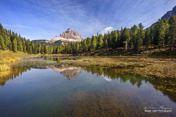 Reflections in the beautiful Lake Misurina in Italys Dolomite Mountains 
