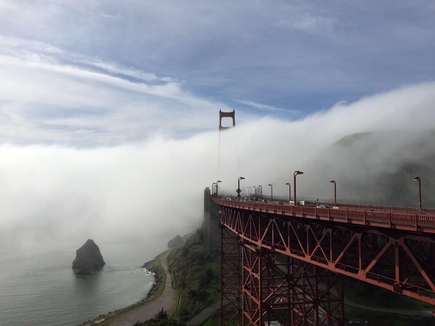 Repost My brother sent me this foggy morning pic he took of the Golden Gate Bridge and I thought it deserved to be on reddit OC 